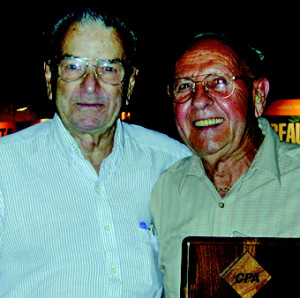Jack Easton receiving the prestigious Robert D. Sawyer Lifetime Achievement Award during CFA Convention 2001 in Niagara Falls, ONT, Canada pictured here with Bob Sawyer.